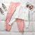 white pink tracksuit
