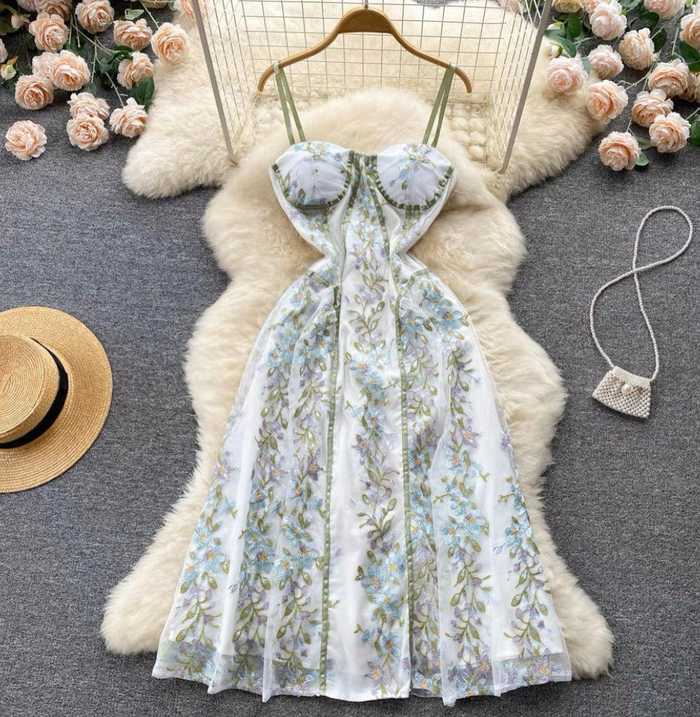 Elena Floral Embroidered Corset Midi Dress featuring blue floral embroidery and a romantic midi silhouette