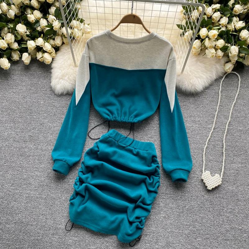 Women’s teal co-ord set with adjustable drawstring details and ruched skirt design