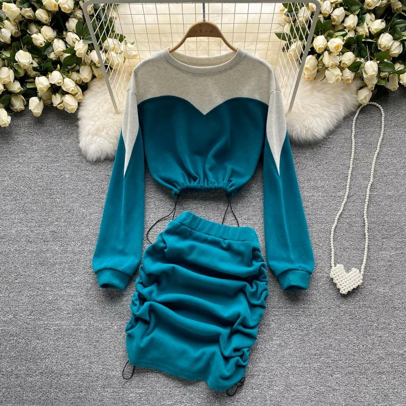 Alia Teal Drawstring Co-Ord Set featuring a color-block cropped sweatshirt and ruched drawstring mini skirt