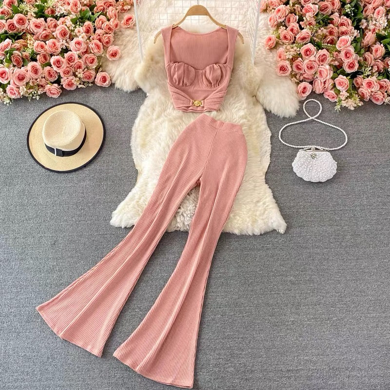 Angelina blush pink ribbed knit co-ord set with bustier crop top and high-waisted flared pants, women’s vacation outfit, resort wear, brunch outfit and matching two-piece set.