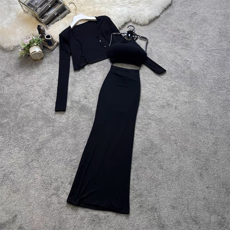 Black three-piece co-ord set featuring a cropped cardigan, camisole top, and ruched maxi skirt.